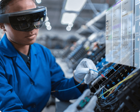 Worker on a factory with a VR headset