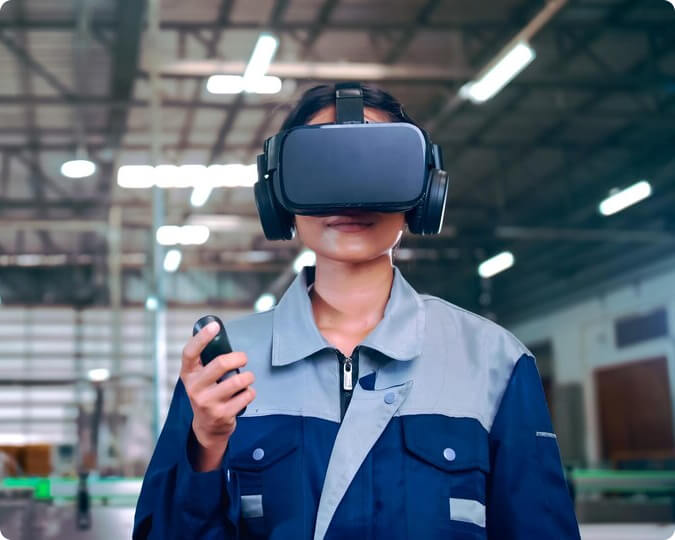 Worker on a factory with a VR headset